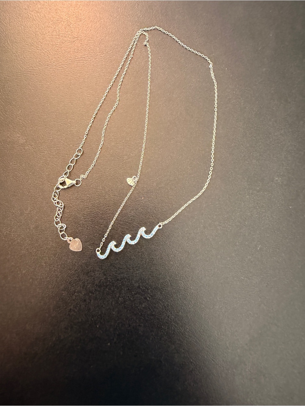 Sterling Silver .925 Wave Pendant Necklace with Blue Gem Accents
